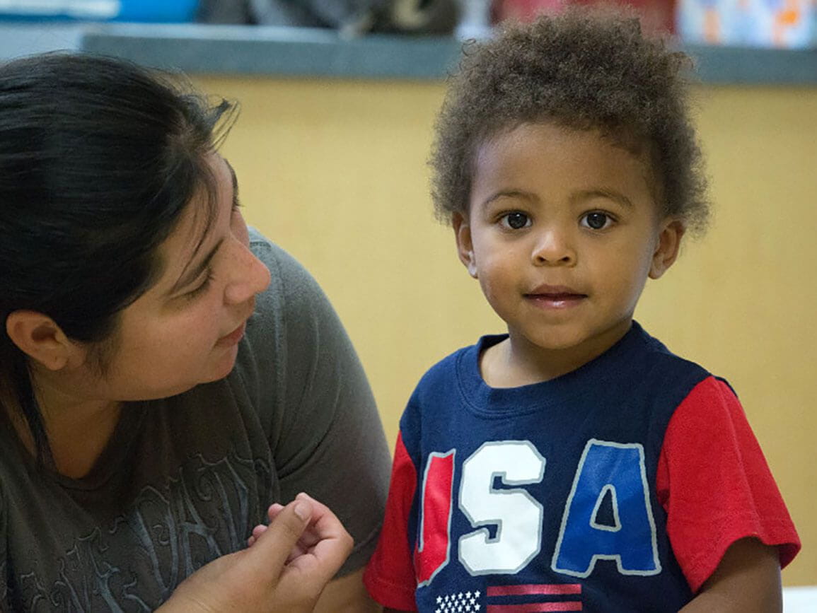 Teacher being patient with a toddler