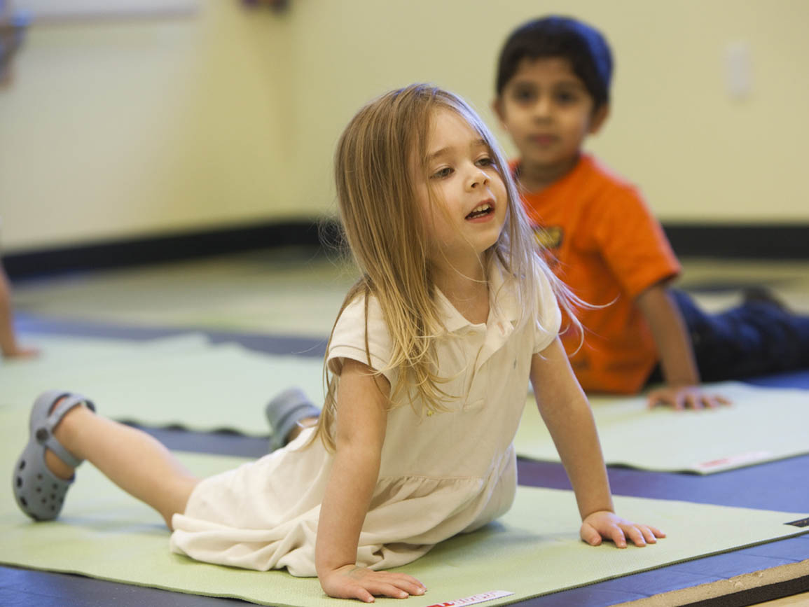Preschool children doing yoga