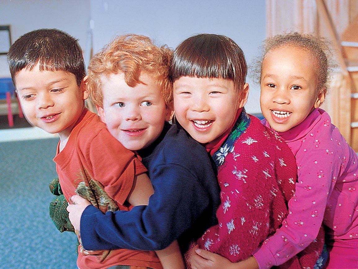 Four children posing together