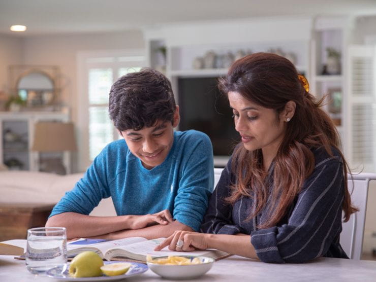 Mom helping son choose his high school curriculum