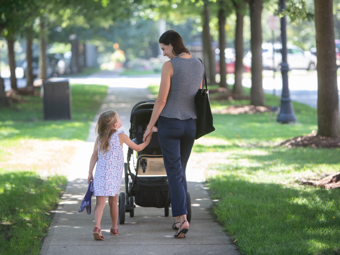 mom walking with preschool daughter