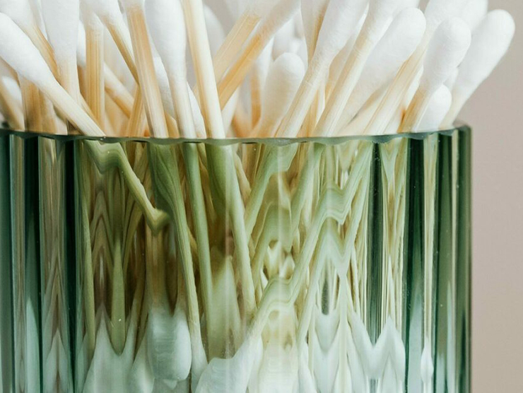 Q-tips in a glass jar 