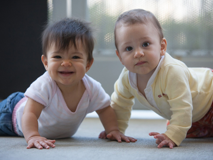Infants smiling