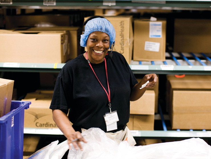 Cardinal Health manufacturing employee in a warehouse