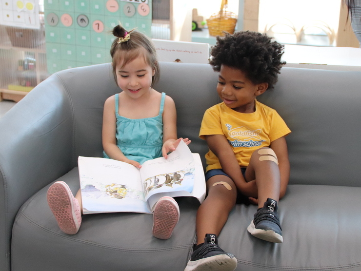 Two children reading at the United Therapeutics Bright Horizons center