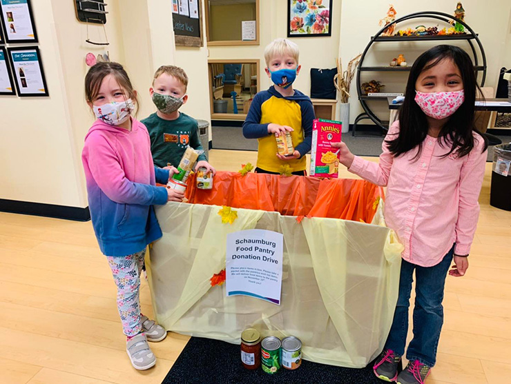 Two young girls cooking for a good cause||