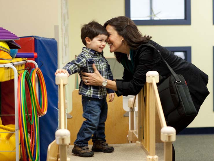 Mom and son at a preschool open house event