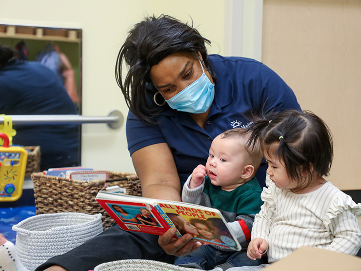 daycare teacher and toddlers starting child care during the pandemic