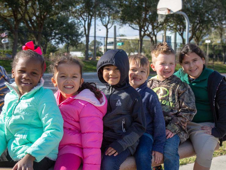 Group of diverse children respecting each others' differences|