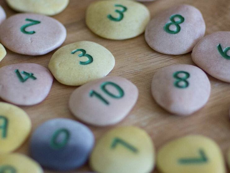 Numbered and pastel colored rocks 