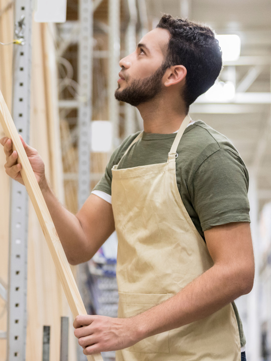 A man constructing a wall