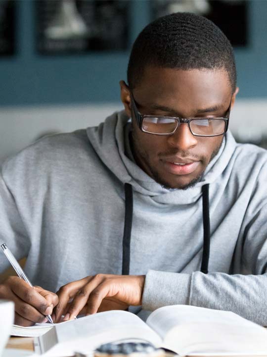 man taking notes