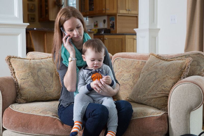 woman with baby calling to get back-up care 