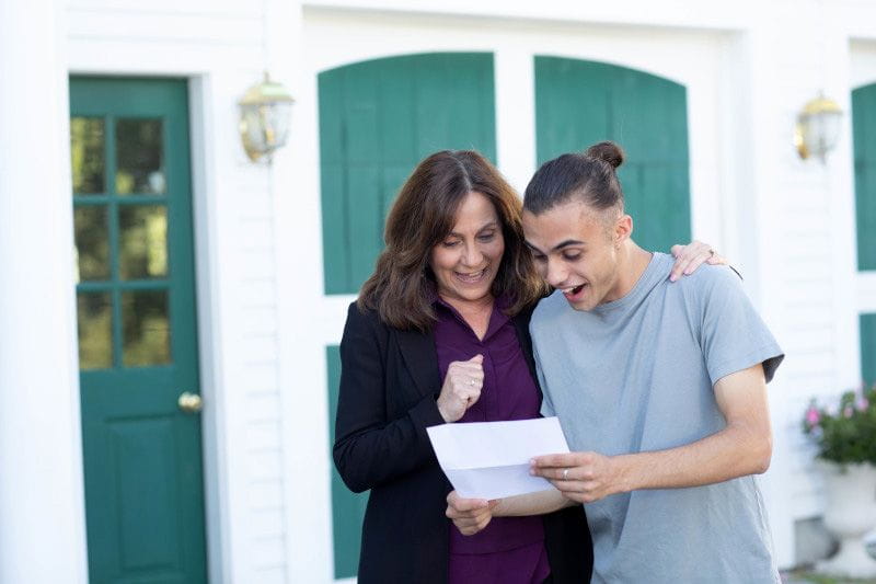 Mom & son using Bright Horizons College Coach to minimize student loan debt