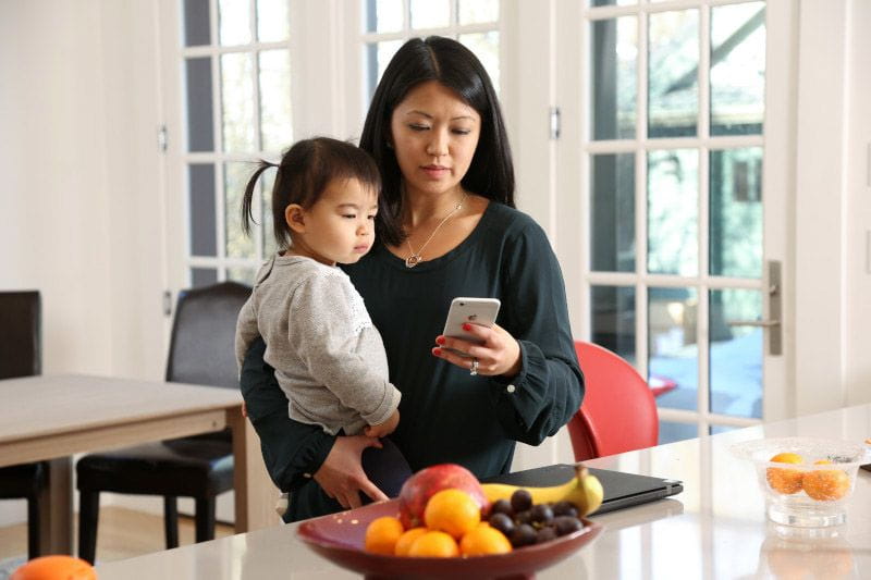 Mom trying to work and parent her toddler at home