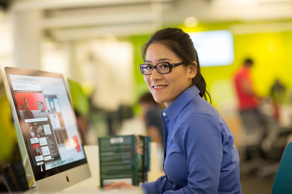 A women in tech working on computer