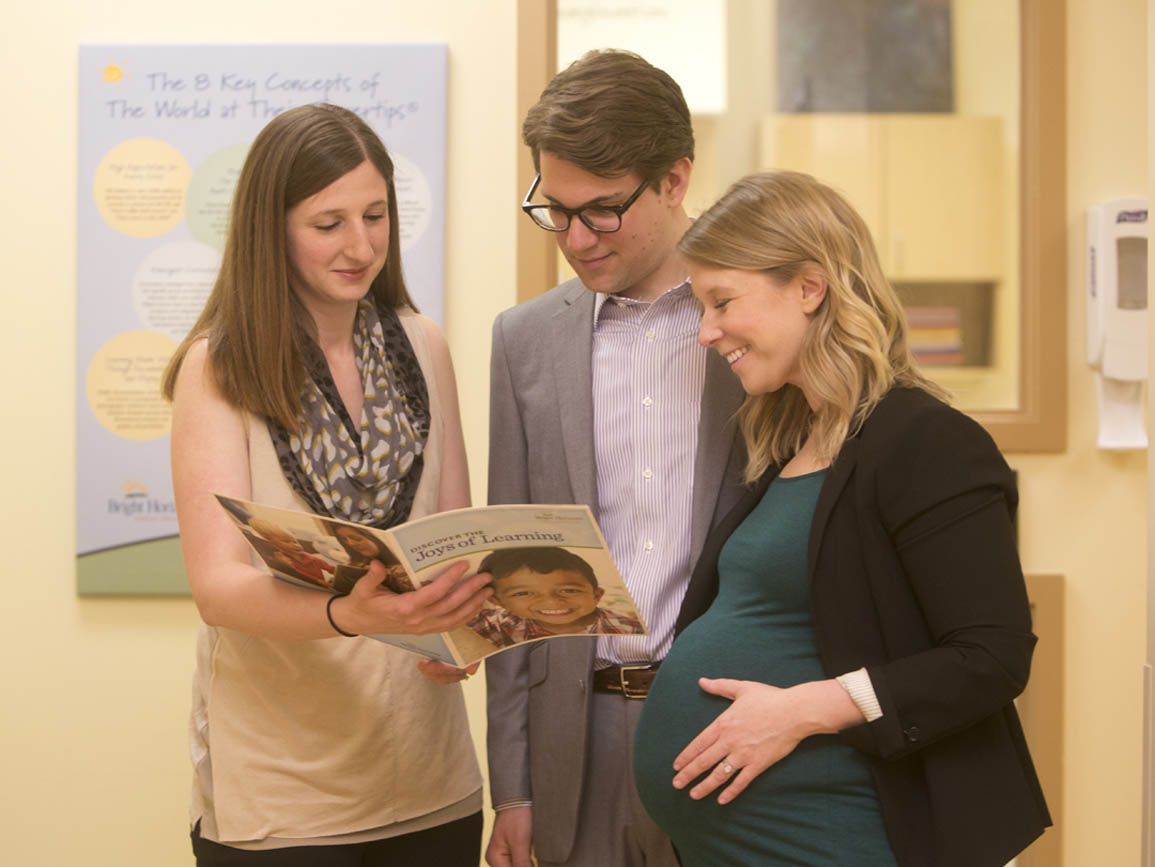 Teacher meeting a family expecting a baby