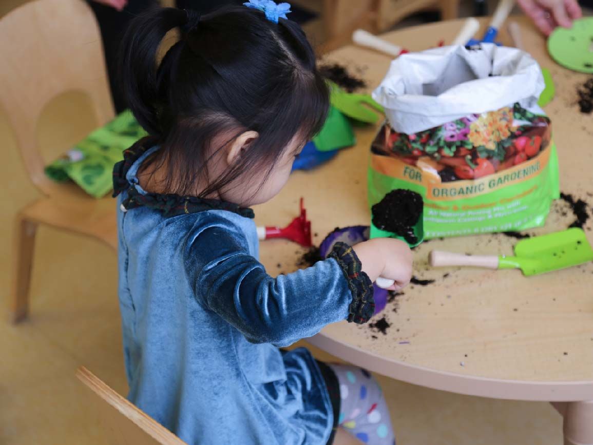 Toddler playing building resilience