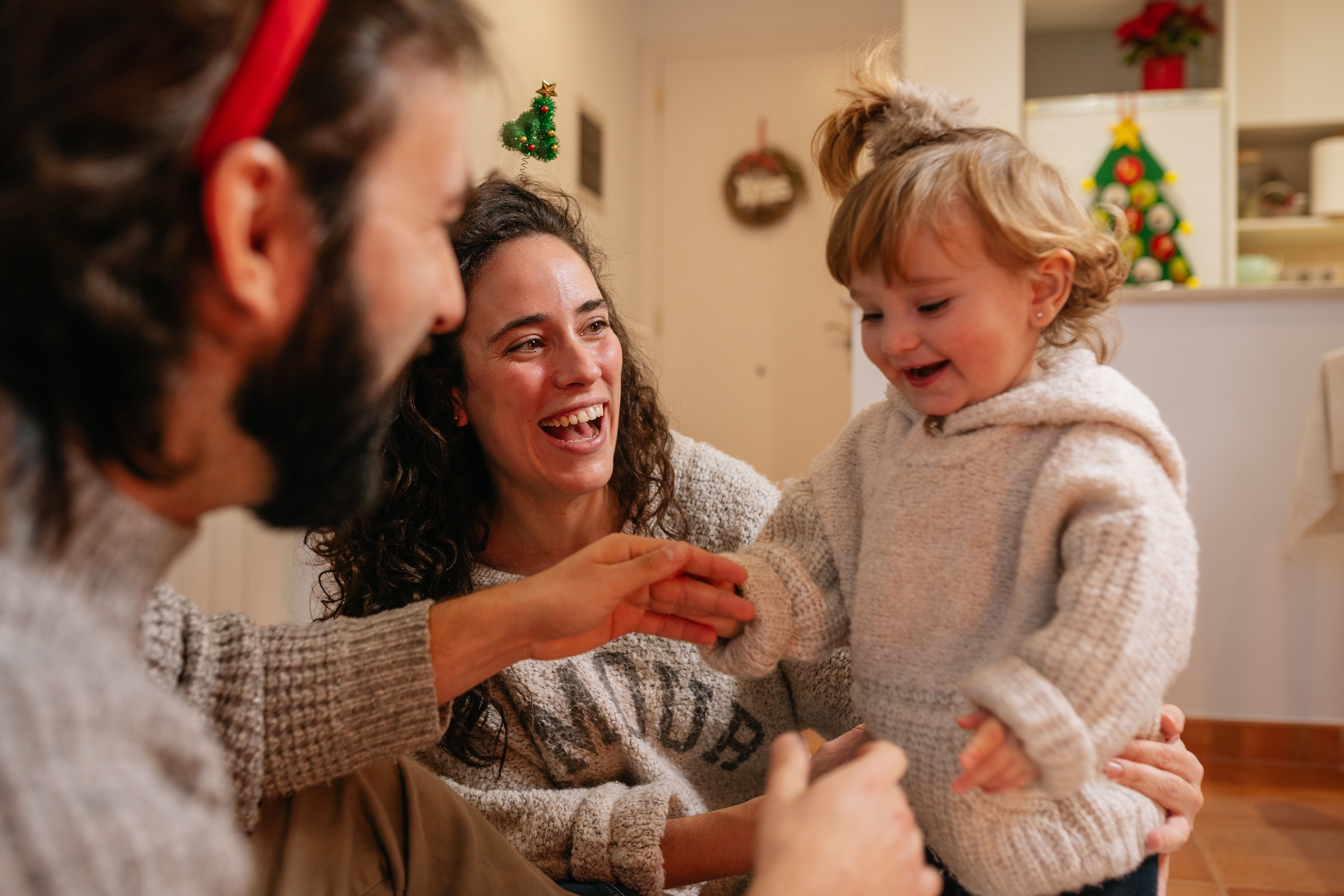 Parents spending time with their daughter