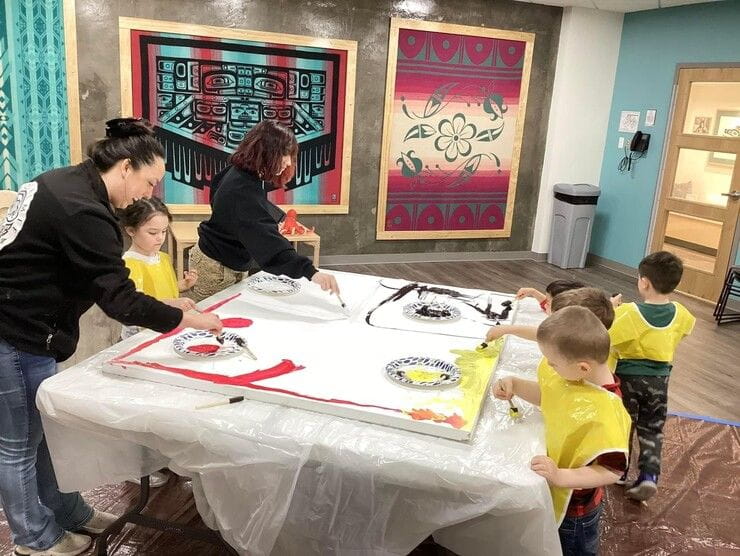 Students painting at the Snoqualmie Tribe Child Care Center