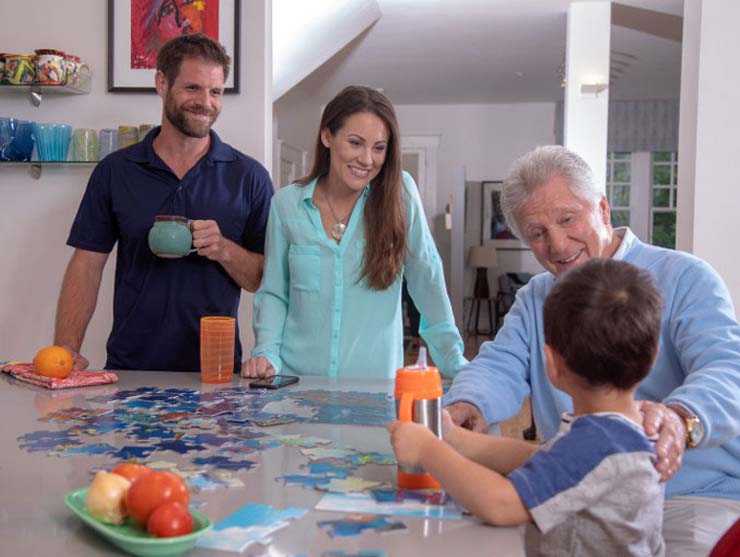 Sandwiched working mom caring for her toddler and aging father