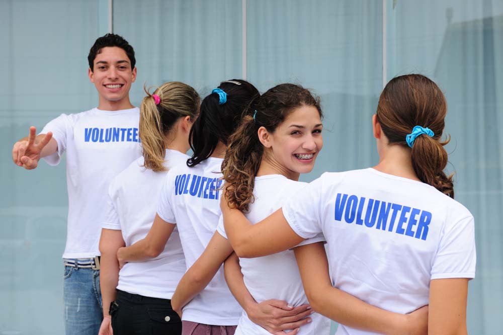 Editor highlighting the impact of volunteering in a workplace setting.