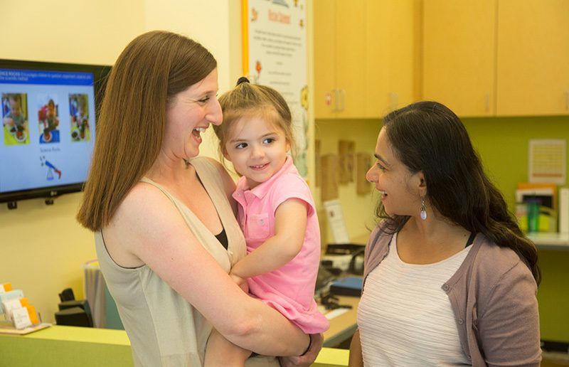 employee at on-site child care center